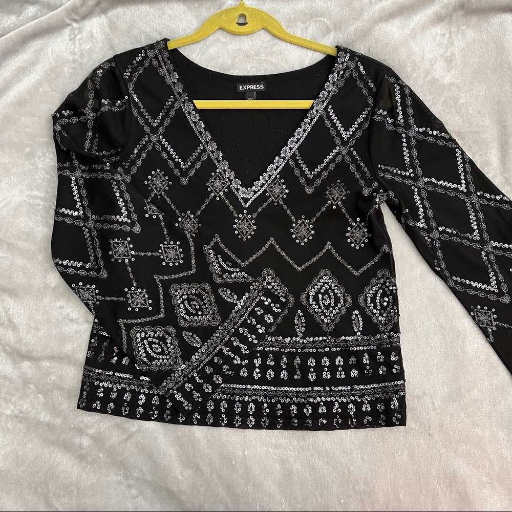 Express beaded top with bell sleeves